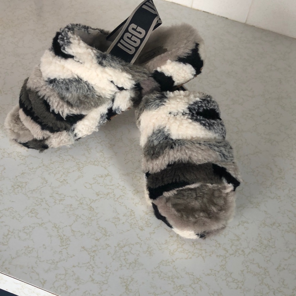 Ugg slippers. Grey white and black